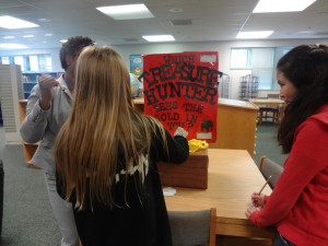 Students Taylor Lewis and Mixi Mitra nominate the Treasure Hunters who see the gold in them, with assistance from School-Based New Horizons Counselor Kimberly Lively.