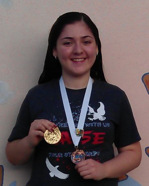 SLWCHS Senior Nathalia Gomez shows off her HOSA medals
