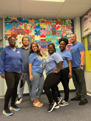 Teachers wearing blue in solidarity for Autism Awareness Month