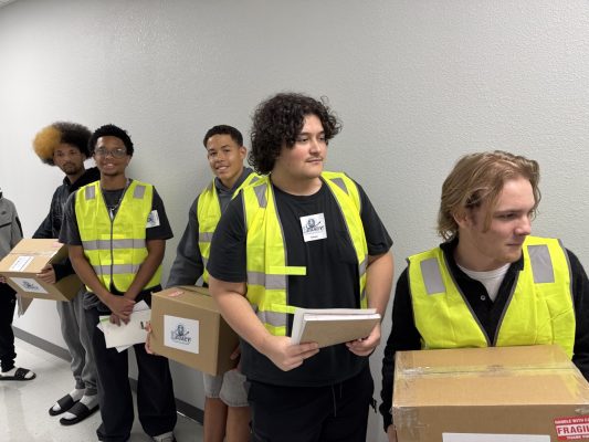 Logistics students await delivery of their packages.
